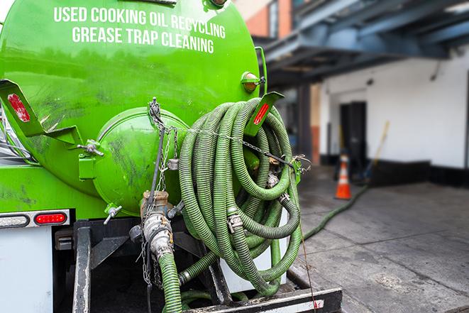 industrial pump clearing a grease trap in Fairfax